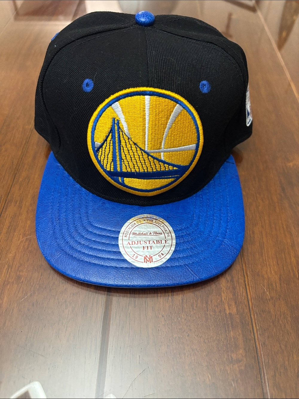 Mitchell & Ness Black, Blue and Yellow Golden State Warriors Snapback